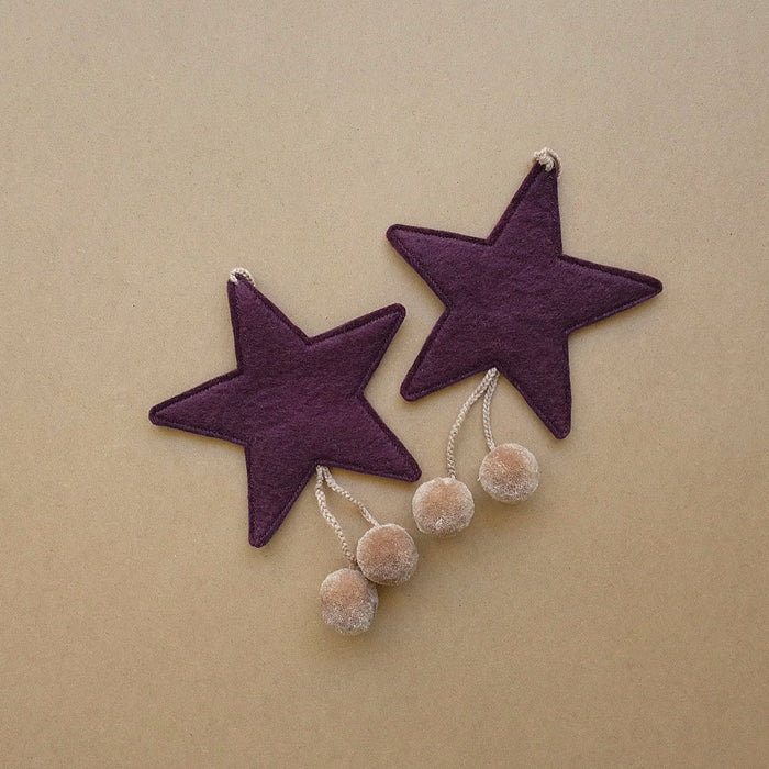 felt star with pompoms - aubergine + quartz pink